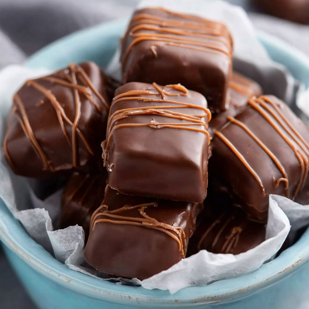 A bowl of butterscotch squares.